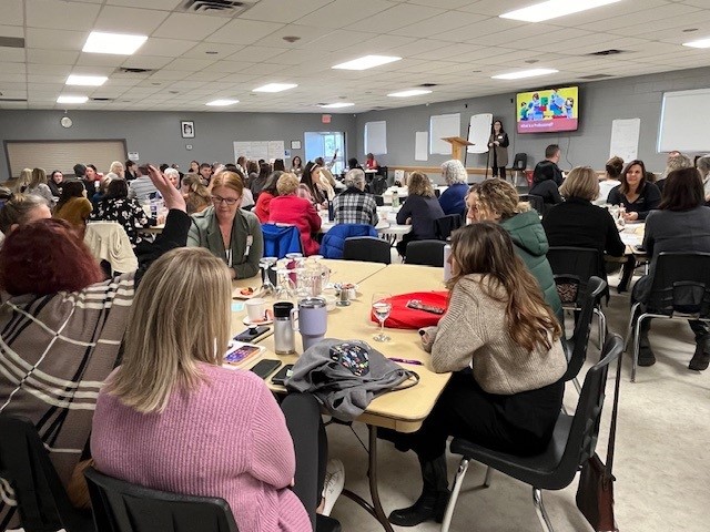 A room of 70 people attending the Service Providers Expo.